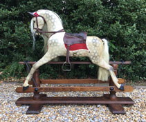 restored dapple grey rocking horse